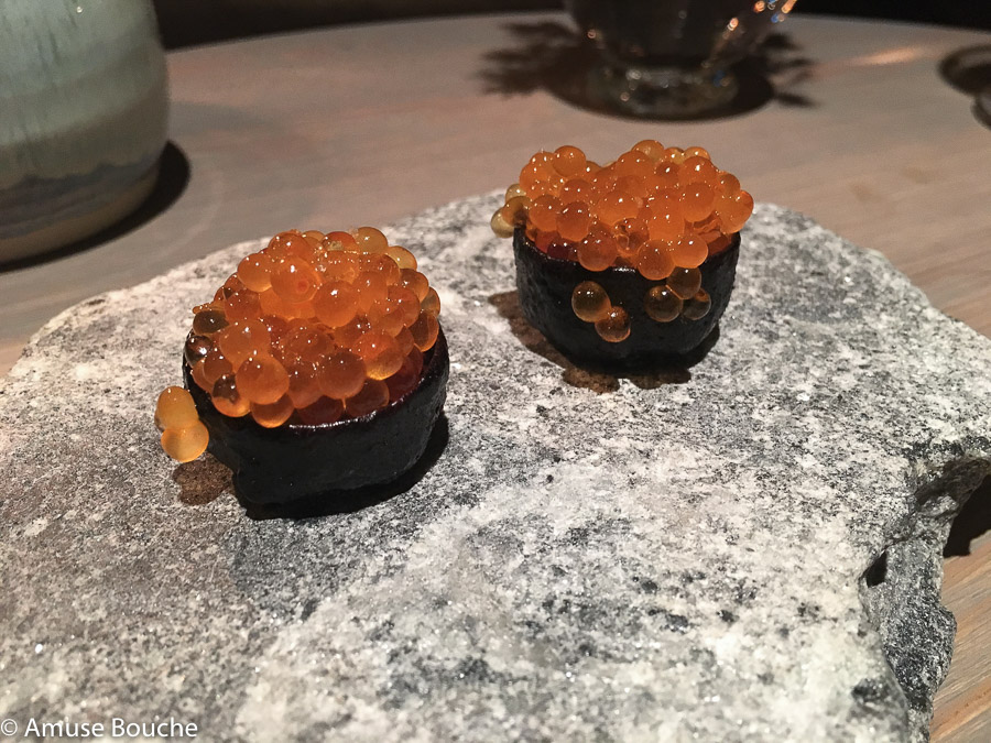 Wild trout roe served in a crust of dried pig’s blood at Faviken