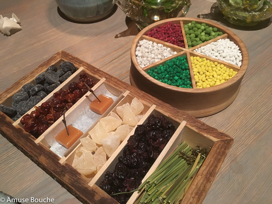 A wooden box filled with tar pastilles, meadowsweet candy at Faviken